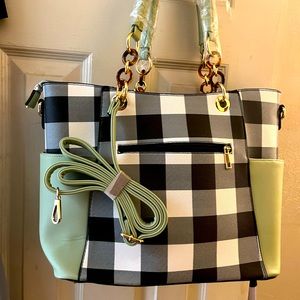 Woman’s tote bag with brown and gold embellishments